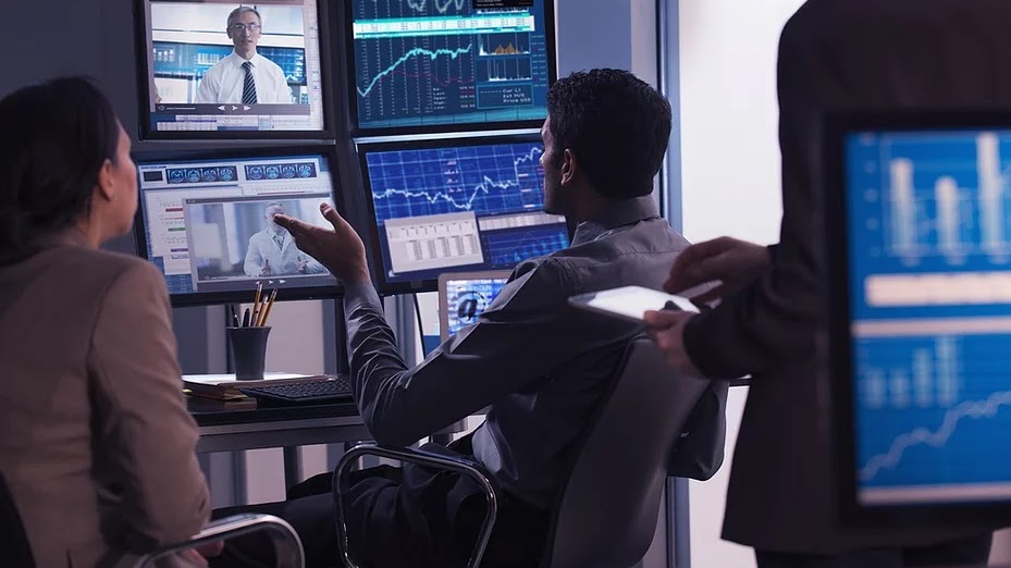 Forex Traders Analyzing Markets